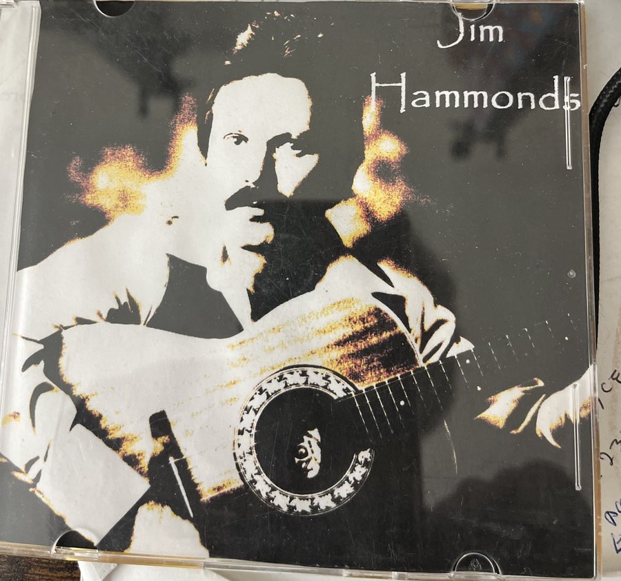 The original Jim Hammonds CD — a sepia portrait with an acoustic guitar